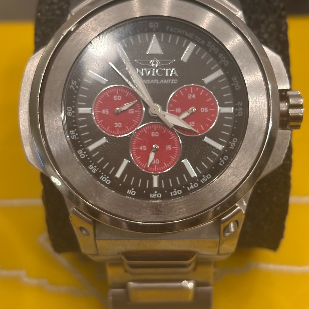 Invicta Silver Chronograph Watch with Red Accents